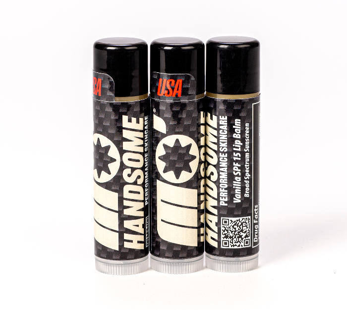 Mo’Handsome SPF 15 vanilla lip balm set in carbon fiber look packaging—close-up showcasing rich, moisturizing lip care for men.